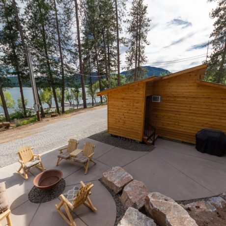 Scenic waterfront view at capturing serene mountain landscapes at Waitts Lake RV Resort and Cabins in Valley, WA.