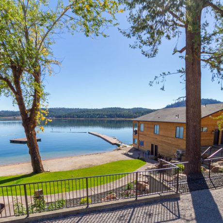 Scenic waterfront view at capturing serene mountain landscapes at Waitts Lake RV Resort and Cabins in Valley, WA.