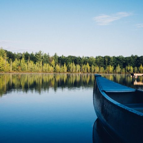 Scenic waterfront view at capturing serene mountain landscapes at Waitts Lake RV Resort and Cabins in Valley, WA.